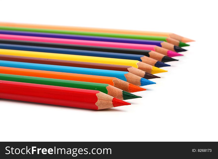 Row colors sharp pencils isolated on white background. Row colors sharp pencils isolated on white background