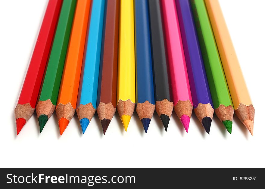 Row colors sharp pencils isolated on white background. Row colors sharp pencils isolated on white background