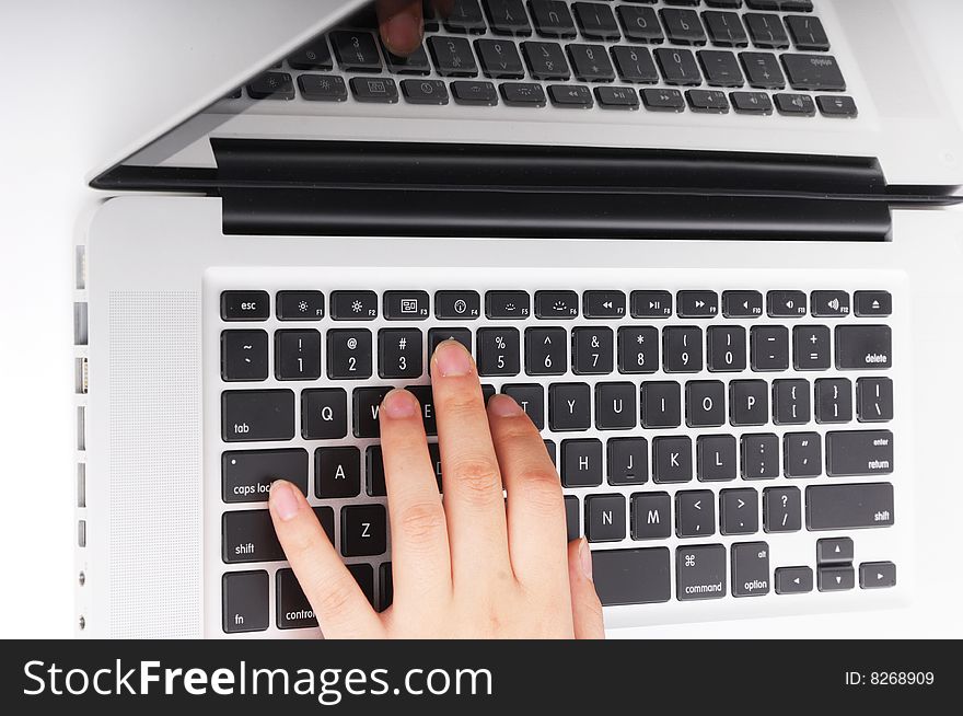 Girl hands typing on keyboard