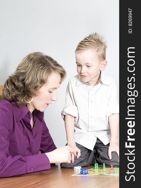 Mother and son played in the board game