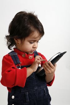 Kid Playing With Phone Stock Images