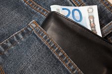 Denim Jeans With A Wallet And A Twenty Euro Note Royalty Free Stock Photo