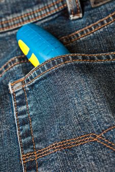 Blue Denim Jeans With A Screw Driver In The Pocket Royalty Free Stock Photo