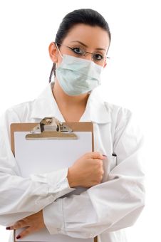Doctor Holding Writing Pad On White Background Royalty Free Stock Photography