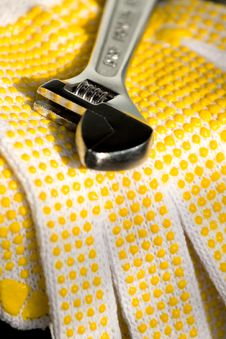 Adjustable Wrench On Gloves Royalty Free Stock Image Adjustable Wrench On Gloves Royalty Free Stock Image