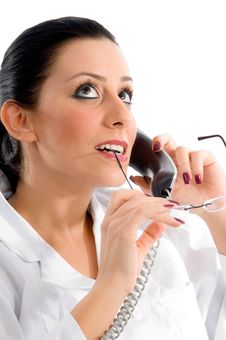 Doctor Talking On Phone And Looking Upward Stock Images Doctor Talking On Phone And Looking Upward Stock Images