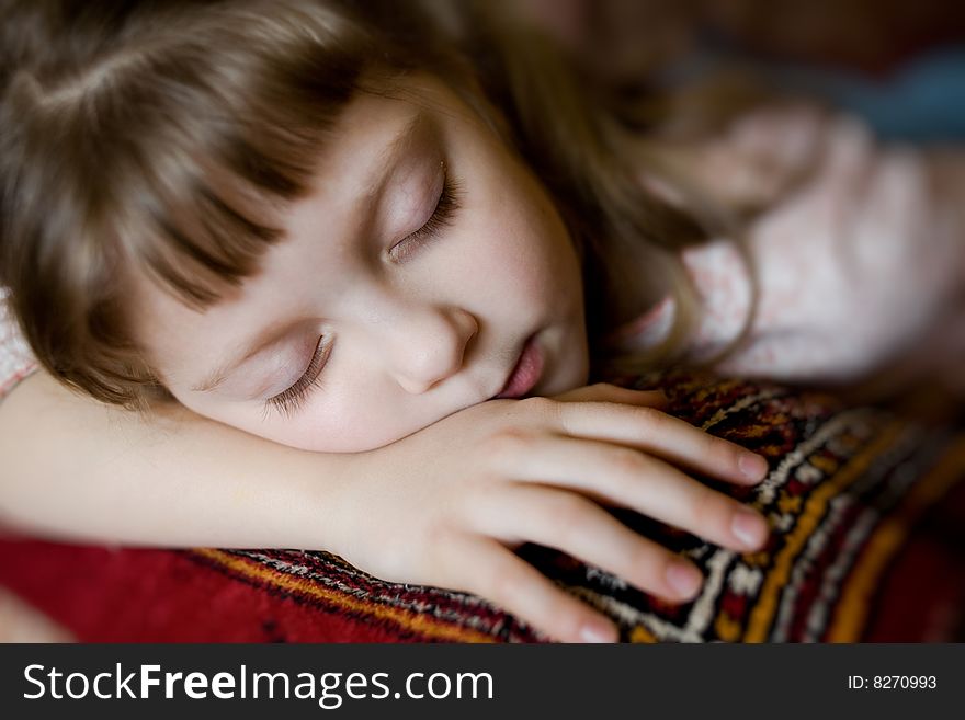 Stock photo: an image of a portrait of a nice sleeping girl closeup