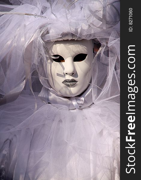 A shot of a very suggestive white mask in venecian carneval. A shot of a very suggestive white mask in venecian carneval