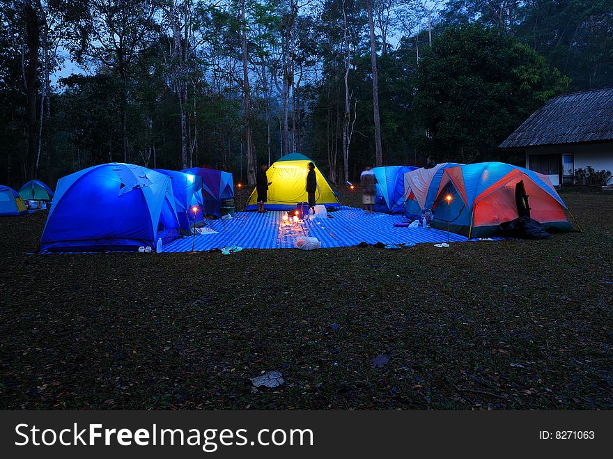 Evening lit tent in camping by nature. Evening lit tent in camping by nature