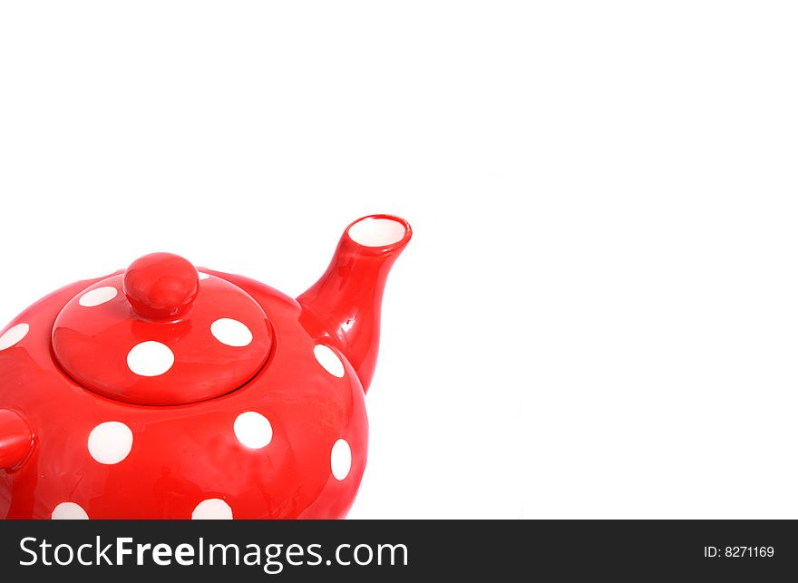 Background with a ceramic teapot of red color.