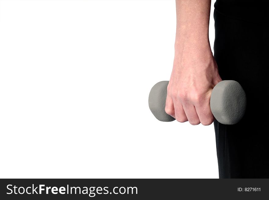 Hand Of A Young Female Excersing With Weights