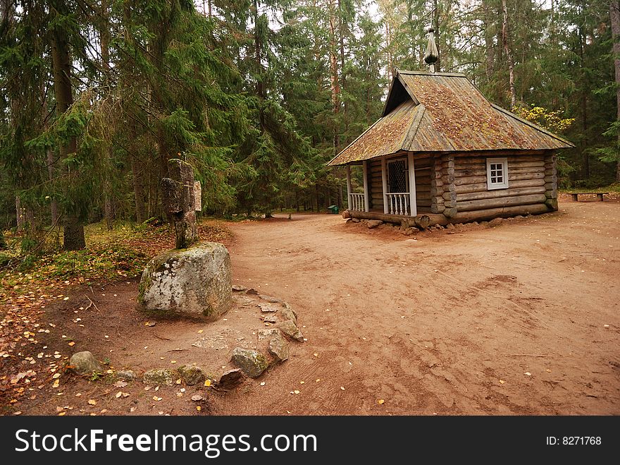 The ancient chapel with a cross. The ancient chapel with a cross