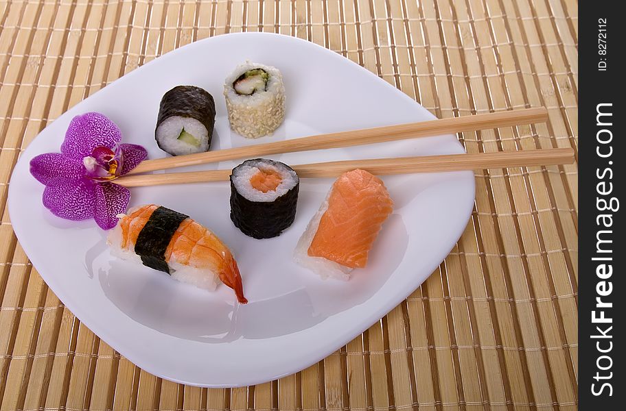 Apanese sushi rolls with orchid