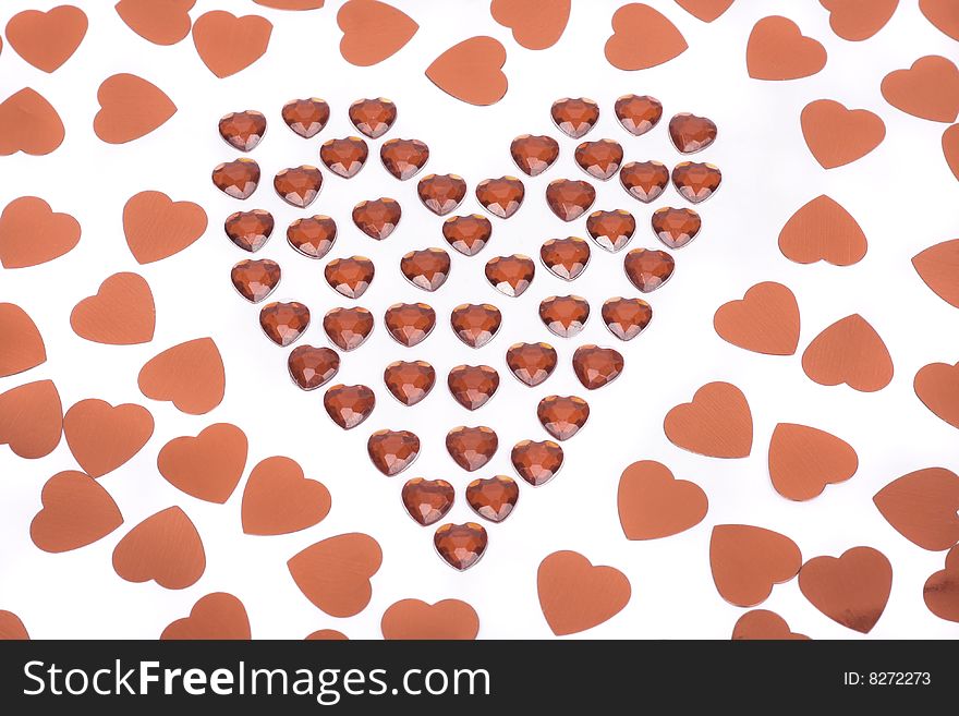 Red heart shapes closeup isolated on white. Red heart shapes closeup isolated on white