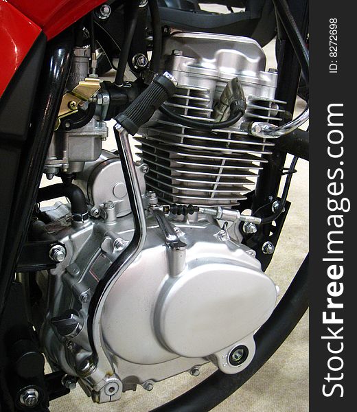 Photo of motorcycle part indoor. Photo of motorcycle part indoor