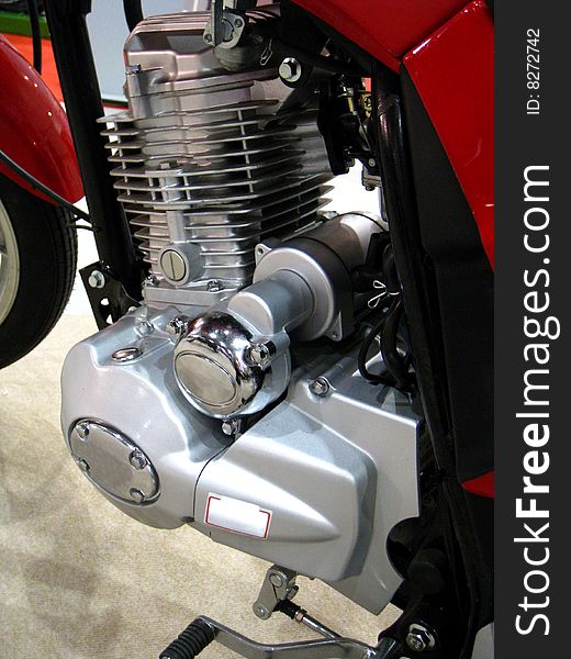 Photo of motorcycle part indoor. Photo of motorcycle part indoor