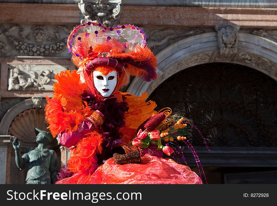 Orange costume at the Venice Carnival. Orange costume at the Venice Carnival