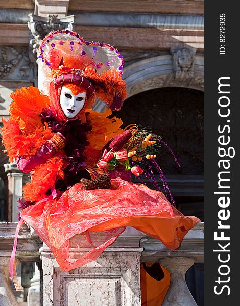 Orange costume at the Venice Carnival. Orange costume at the Venice Carnival