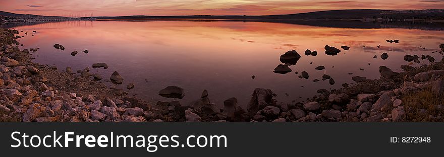 Idyllic sunset over sea water