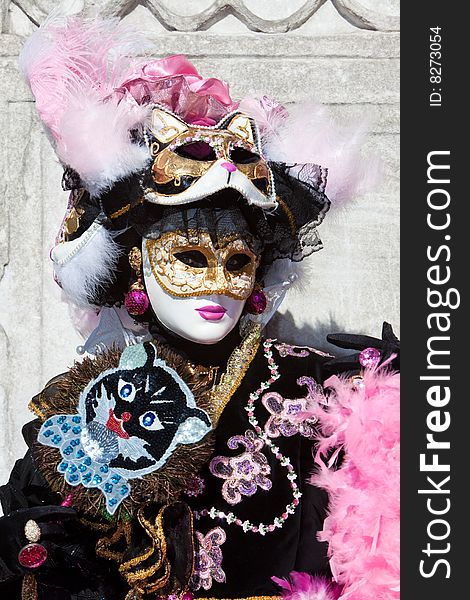 Black costume with cat masks at the Venice Carnival. Black costume with cat masks at the Venice Carnival