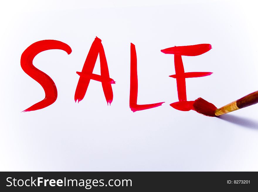 Red word sale painting with brush, isolated