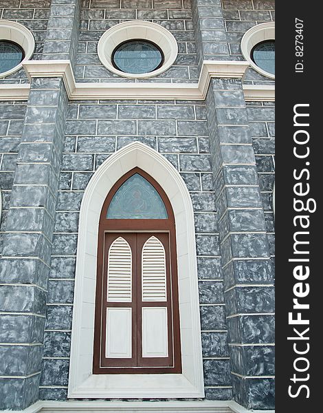 Gothic style window of over 100 years old church in Ratchaburi province, Thailand. Gothic style window of over 100 years old church in Ratchaburi province, Thailand.