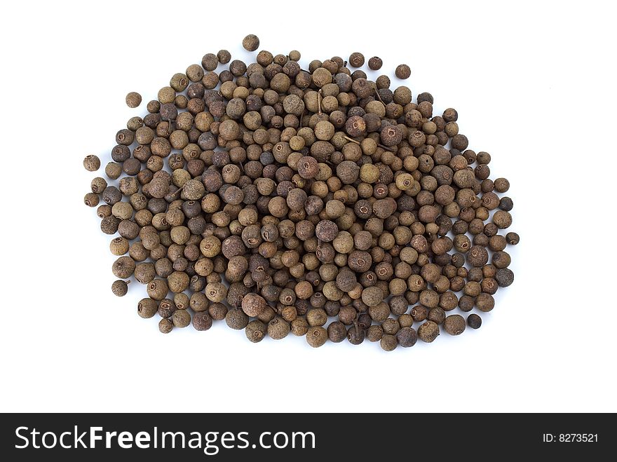 Spices: pile of allspice  isolated on the white background