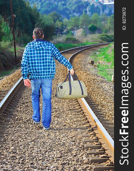 Man walking on a railway. Man walking on a railway