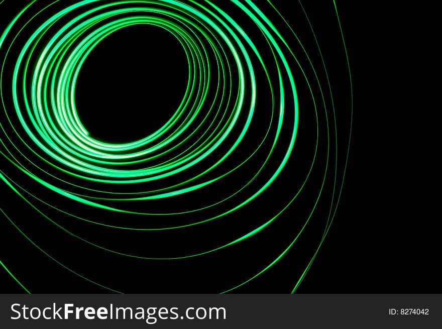A glowing green physiogram on a black background. A glowing green physiogram on a black background