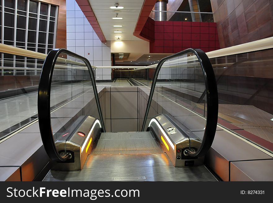 Escalator. Futuristic modern airport architecture