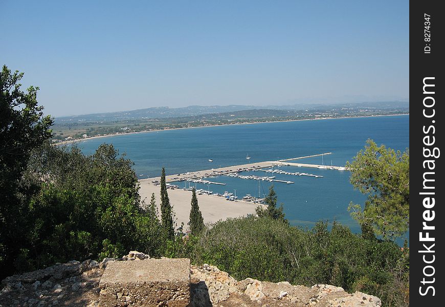 A marina in Greece as seen from the top of a hill. A marina in Greece as seen from the top of a hill.