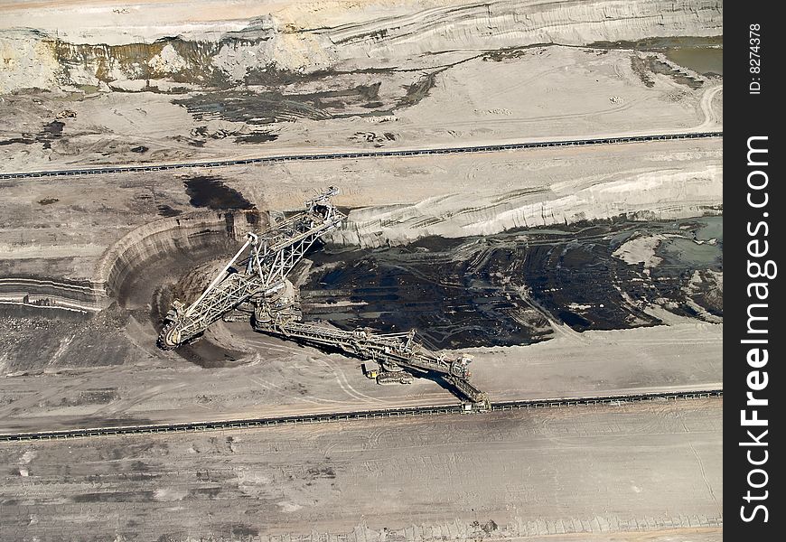 Large excavator in coal mine, aerial view. Large excavator in coal mine, aerial view