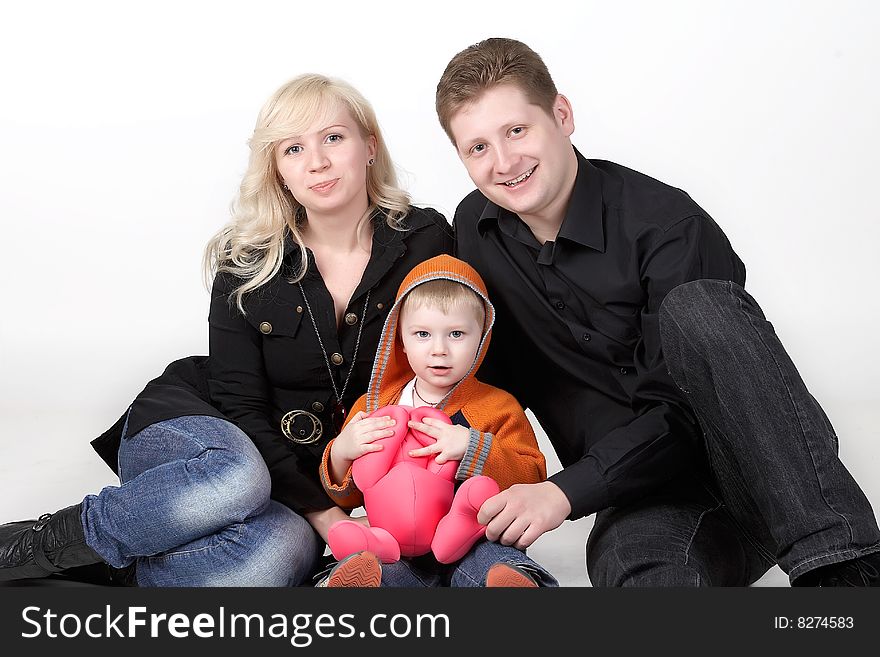 Happy family with baby on white background. Happy family with baby on white background