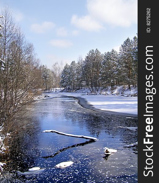 Beautiful winter landscape with ice river