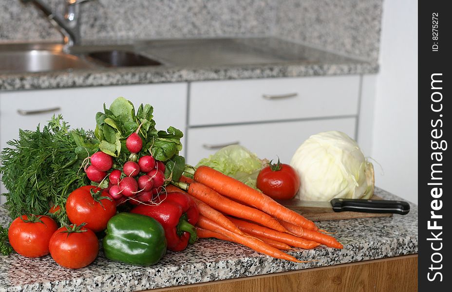 Different vegetables on the table in the kitchen