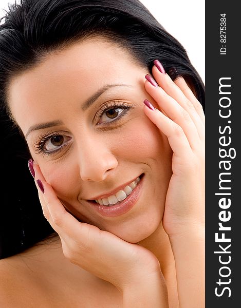 Top view of smiling young woman scrubbing her body against white background. Top view of smiling young woman scrubbing her body against white background