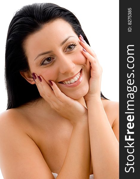 Top view of smiling young woman scrubbing her body against white background. Top view of smiling young woman scrubbing her body against white background