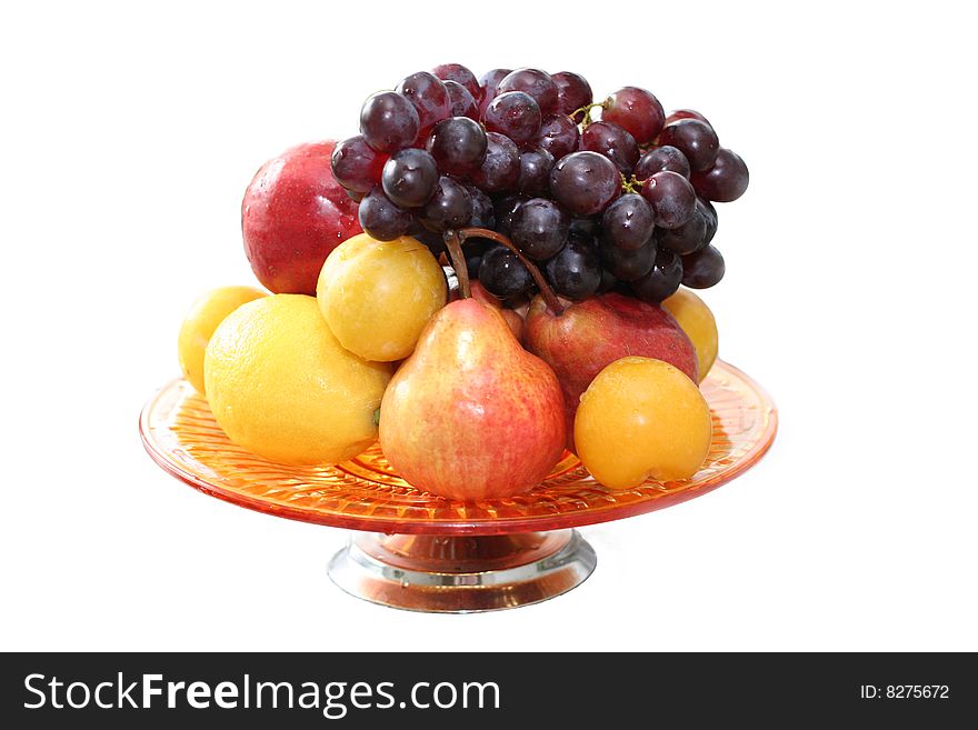 Red, orange and yellow fruits over white background. Red, orange and yellow fruits over white background