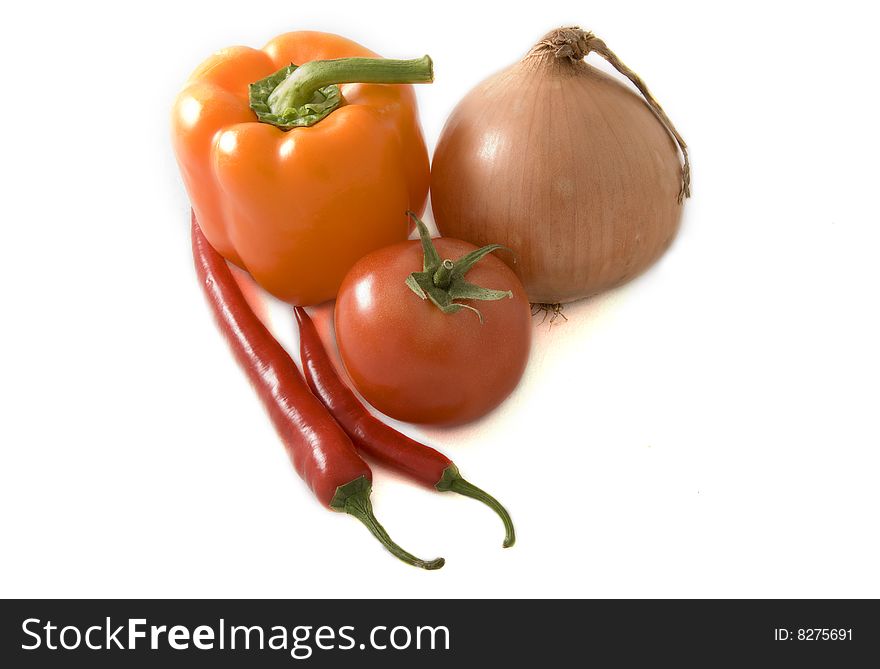 Paprika onion tomato and chili isolated on white background. Paprika onion tomato and chili isolated on white background