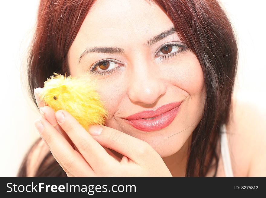 Woman portrait with chicken baby