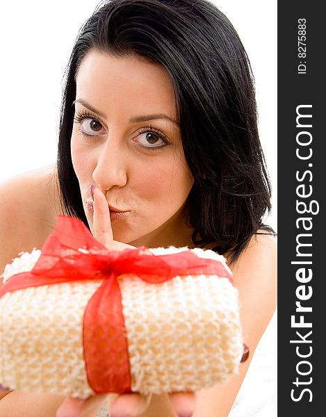 Top view of young woman showing scrubber on an isolated background. Top view of young woman showing scrubber on an isolated background