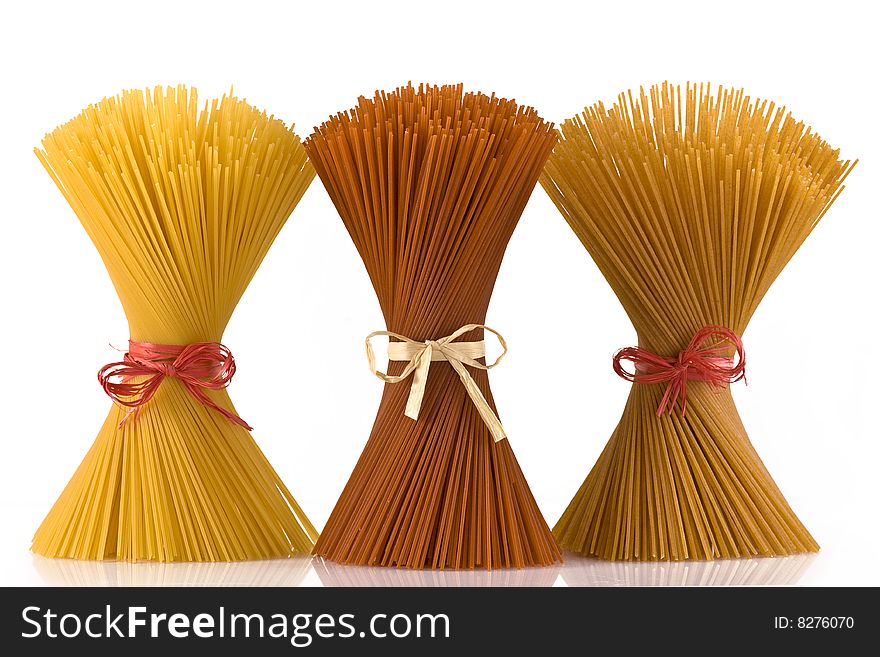 Colorful collection of spaghetti on white background