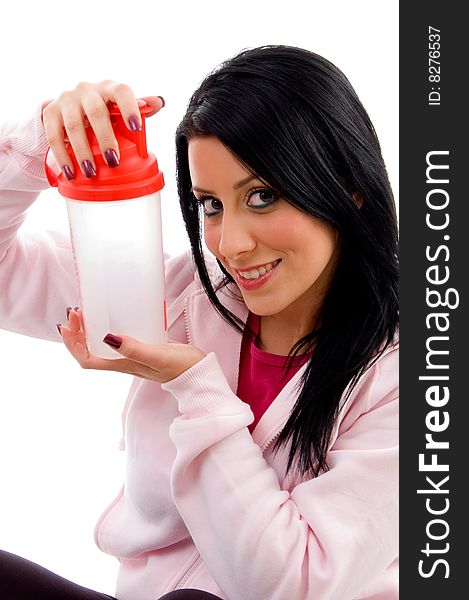 Front view of smiling female holding water bottle with white background. Front view of smiling female holding water bottle with white background