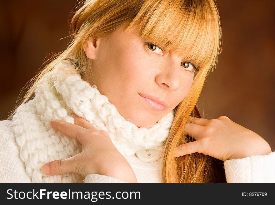 Portrait of lovely blond with white scarf