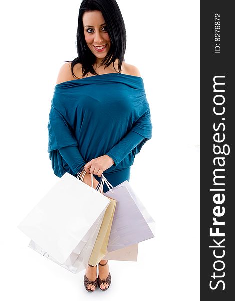 Front view of model with shopping bags on an isolated white background. Front view of model with shopping bags on an isolated white background