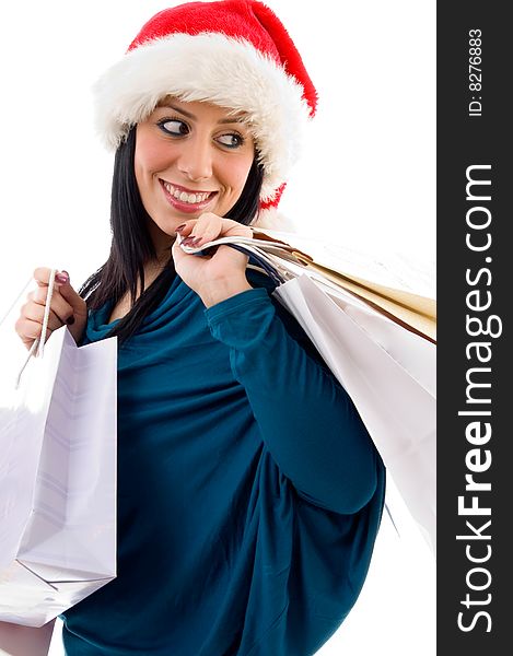 Side pose of christmas woman holding bags on an isolated background. Side pose of christmas woman holding bags on an isolated background