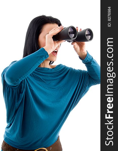Side pose of female looking through binocular on an isolated white background