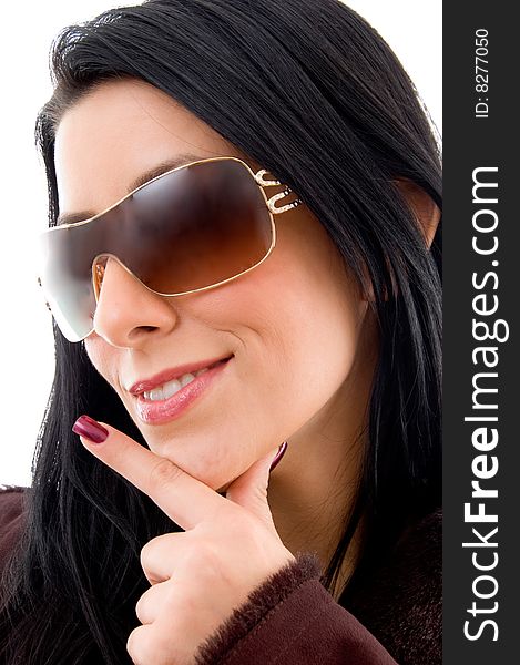 A side face of young smiling woman with sunglasses