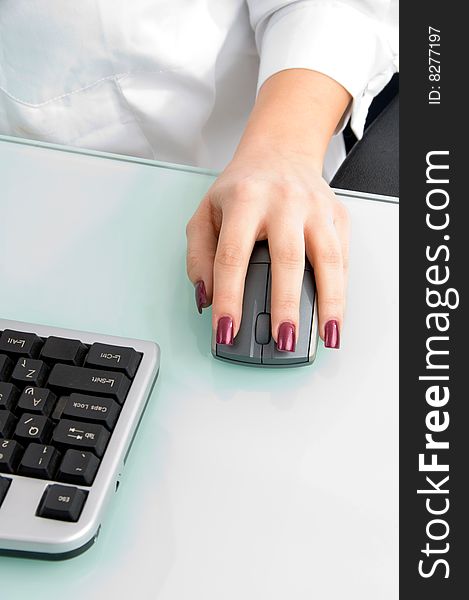 Mouse in female hand and keyboard. Mouse in female hand and keyboard