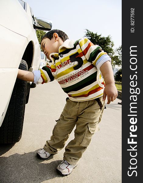 Boy washing car